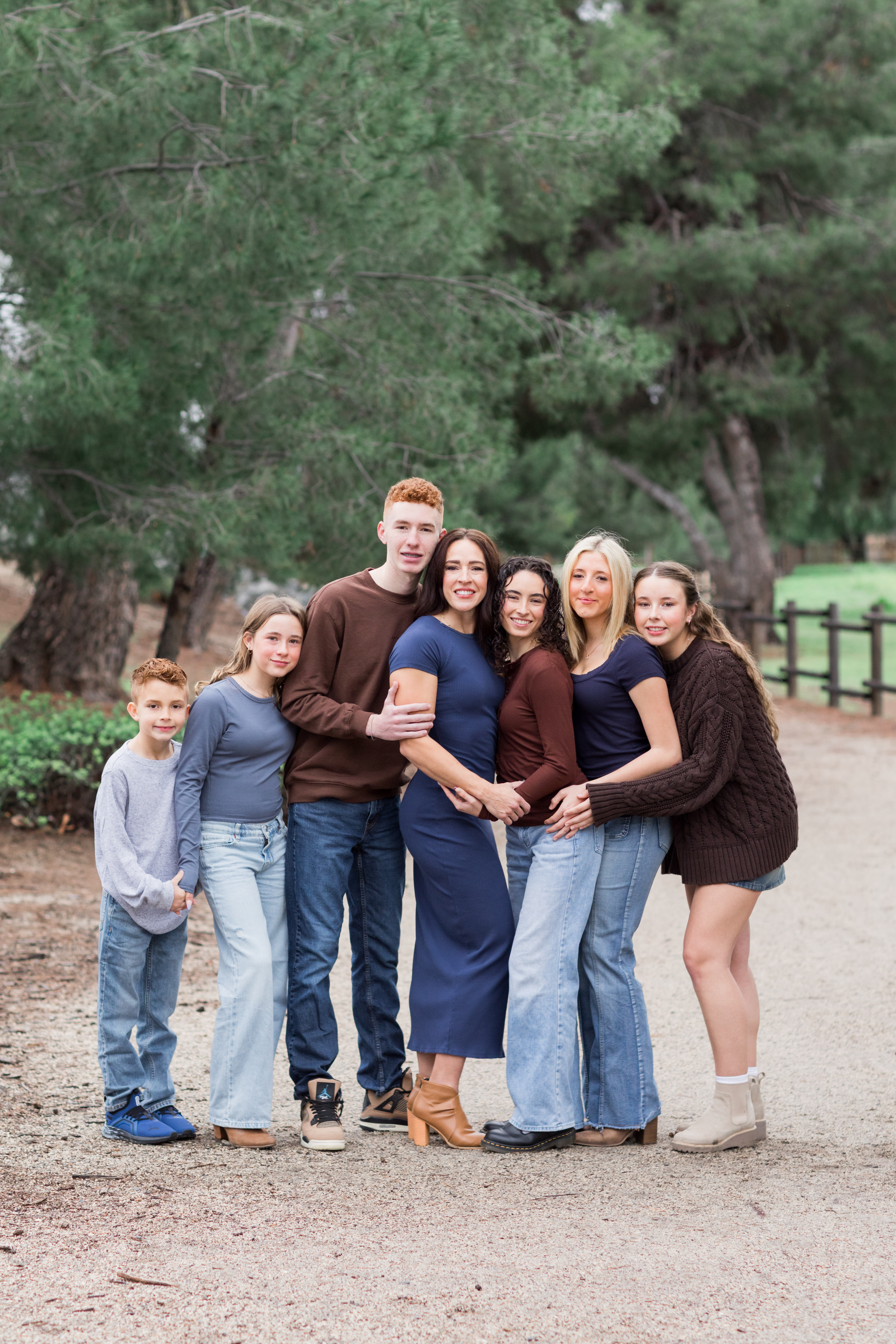 Family portraits taken at Yorba Linda Regional park with a mother and her six children.